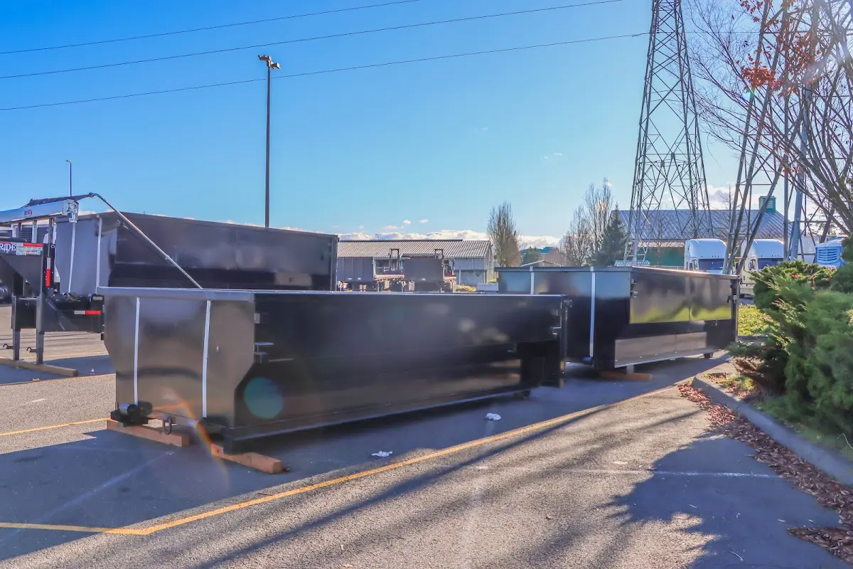 Roll-off dumpster ready for waste disposal at job site for Construction Dumpster Rental in Highland Park